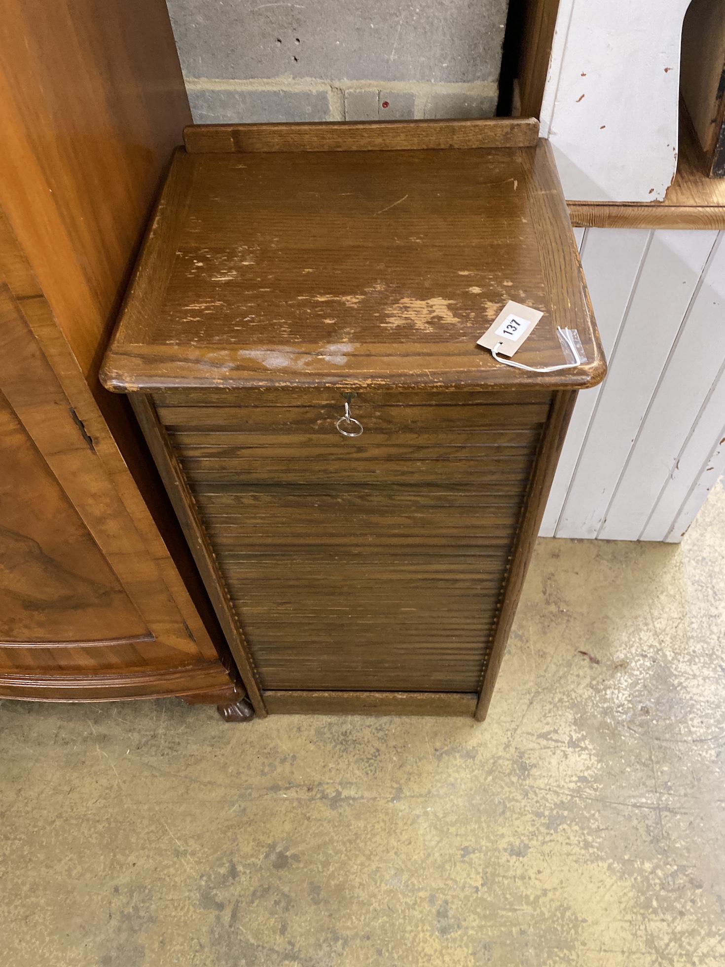 A mid century oak tambour filing cabinet, width 46cm, depth 40cm, height 93cm